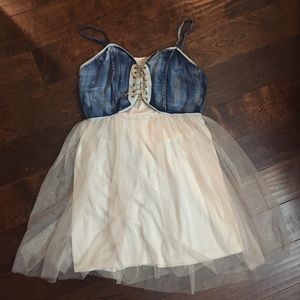 Lace up denim spaghetti strap dress.